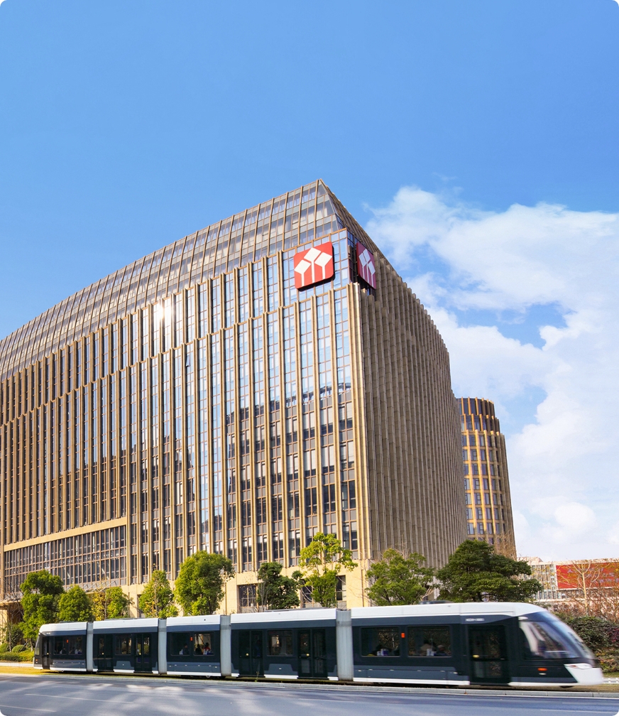 One of Huatai Securities headquarters with a light rail passing by.